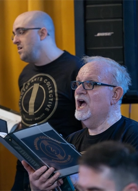 A Harmony Collected singer mid-song